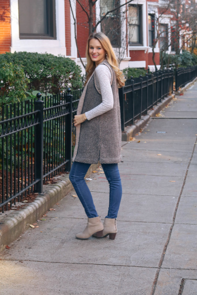 Staying cozy with a wool knit Club Monaco vest essential for a Boston winter