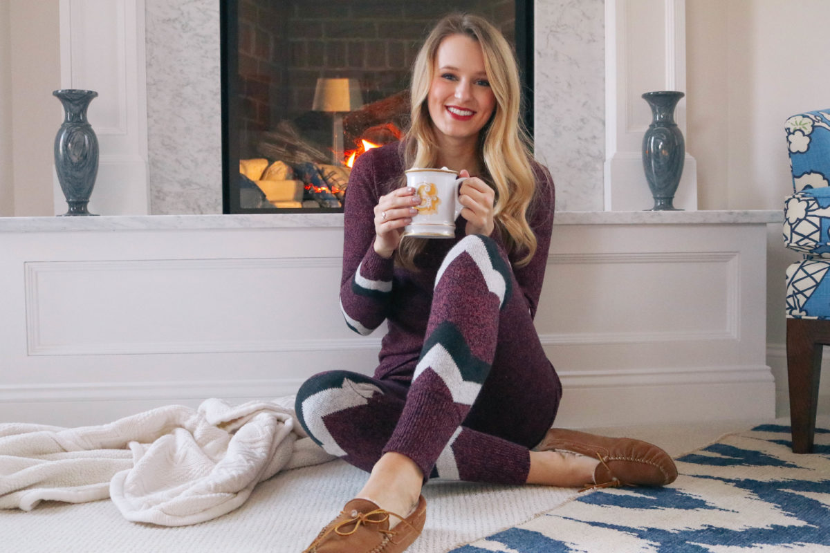 Lifestyle blogger Leigha Gardner of The Lilac Press cozy by the fire in New England wearing Hottotties