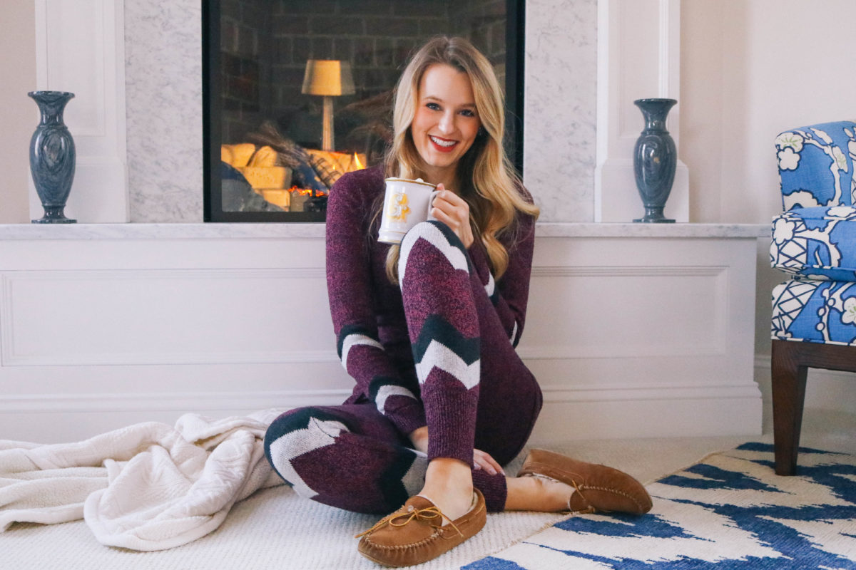 Lifestyle blogger Leigha Gardner of The Lilac Press cozy by the fire in New England wearing Hottotties