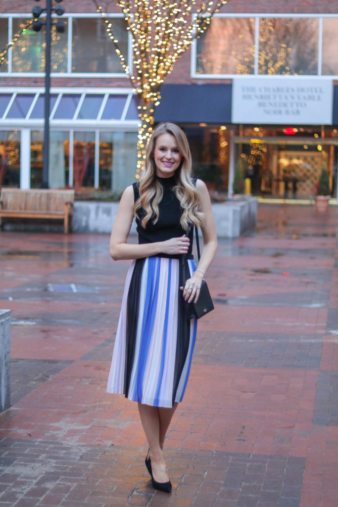 Style blogger, Leigha Gardner, of the The Lilac Press wearing a striped pleated midi skirt from Club Monaco for an event at The Charles Hotel in Cambridge.