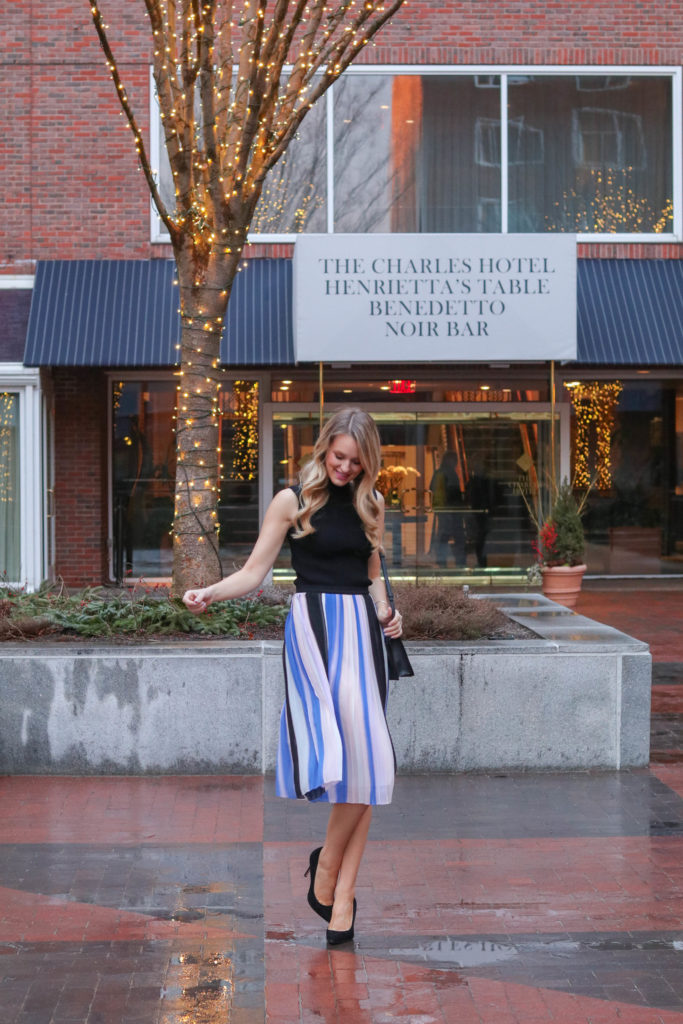 Style blogger, Leigha Gardner, of the The Lilac Press wearing a striped pleated midi skirt from Club Monaco for an event at The Charles Hotel in Cambridge.