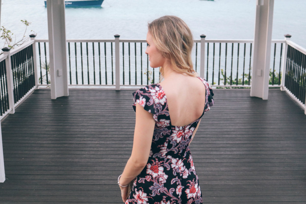 Style blogger Leigha Gardner of The Lilac Press wearing a floral Club Monaco jumpsuit while heading to dinner on Saint Thomas, USVI