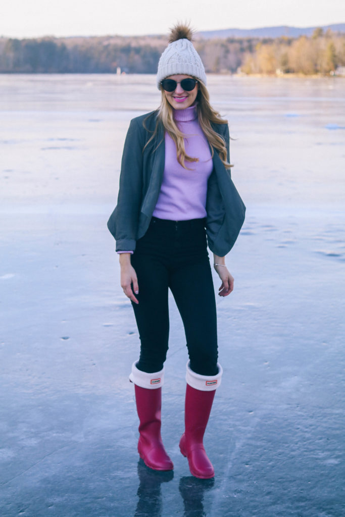 Lifestyle blogger Leigha Gardner of The Lilac Press exploring frozen Laurel Lake in the Berkshires for some "ice skating" (with Hunter boots).
