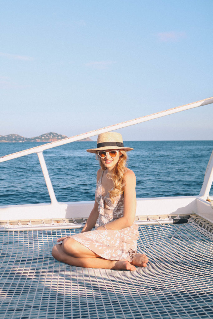 Lifestyle blogger, Leigha Gardner, of The Lilac Press sharing evening sailing style while heading to St. John, USVI, for dinner.