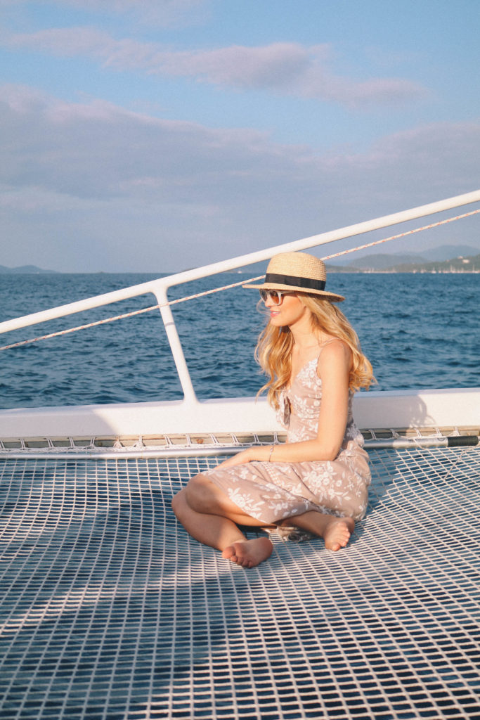 Lifestyle blogger, Leigha Gardner, of The Lilac Press sharing evening sailing style while heading to St. John, USVI, for dinner.