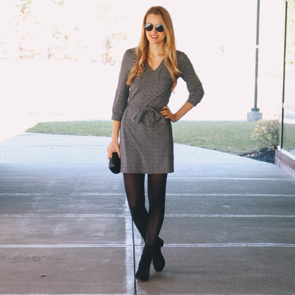 Lifestyle blogger, Leigha Gardner, of The Lilac Press wearing a black and white printed dress by Ellie Kai.