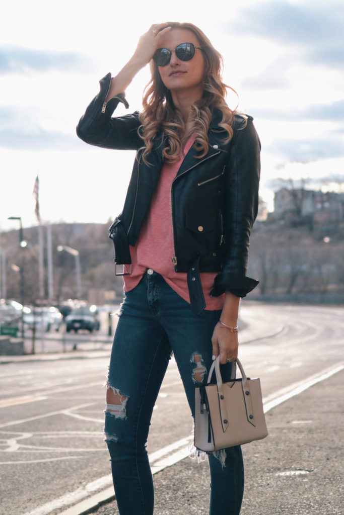 Lifestyle blogger, Leigha Gardner, of The Lilac Press wearing a leather jacket and sharing tips for pulling off an edgier look.