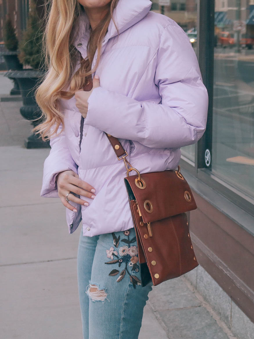 embracing spring with floral embroidered denim and a lilac puffer